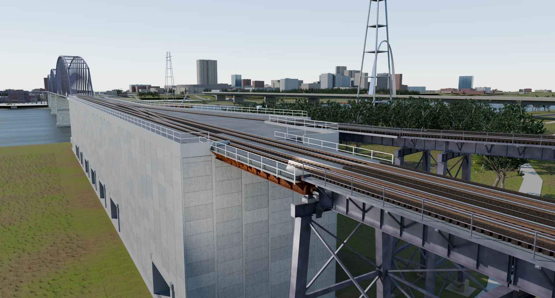 The precast retaining wall and the double track on it running away toward the downtown St. Louis skyline, the truss bridge and the river on the left.