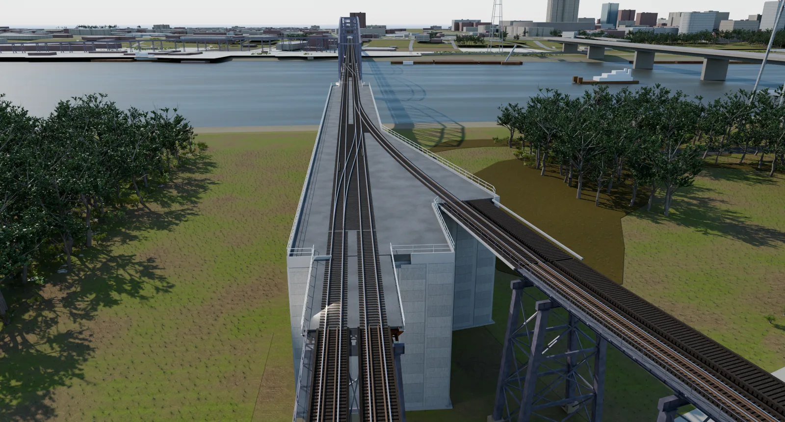 Looking along the bridge deck from above the wall, both tracks converging through the turnout, the truss and downtown ahead.
