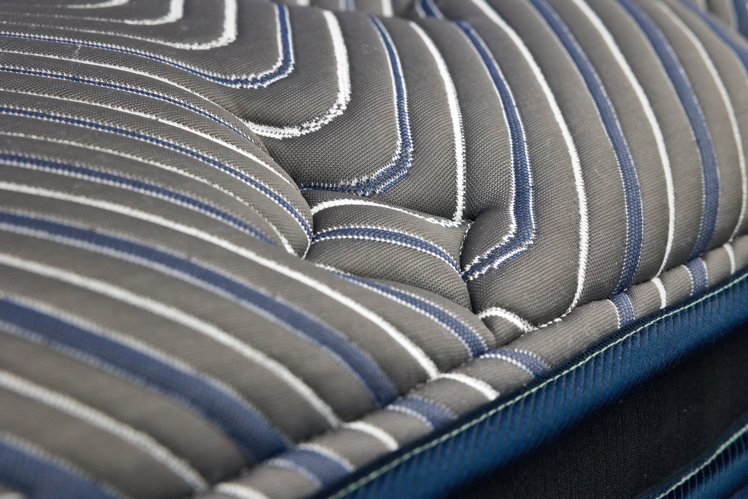 Close-up of the striped quilting on a pillow-top mattress