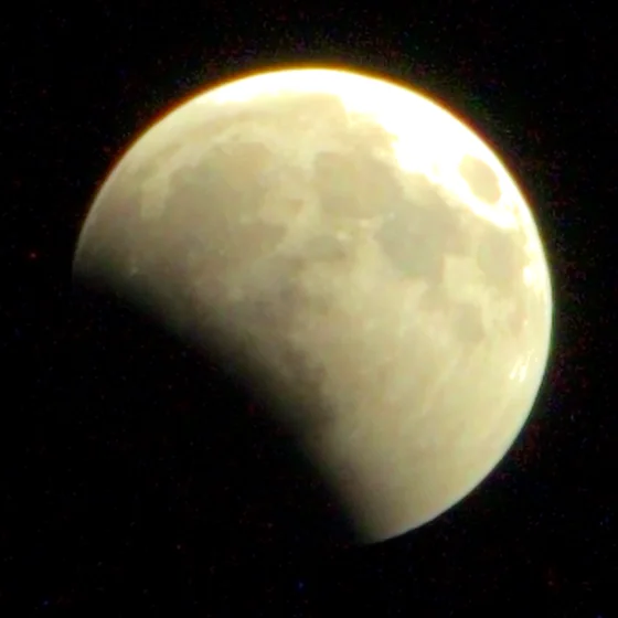 The moon at 21:50, a bite taken out of one limb.