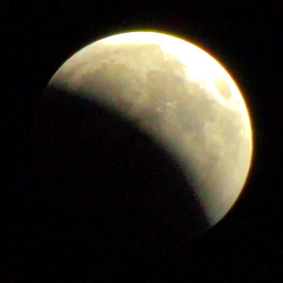 The moon at 22:10, a bite taken out of one limb.
