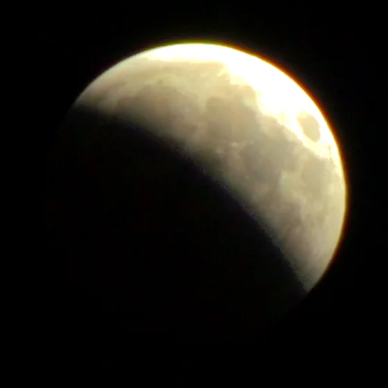 The moon at 22:13, a bite taken out of one limb.