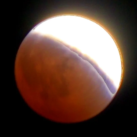 The moon at 22:23, the shadow across half the disc.