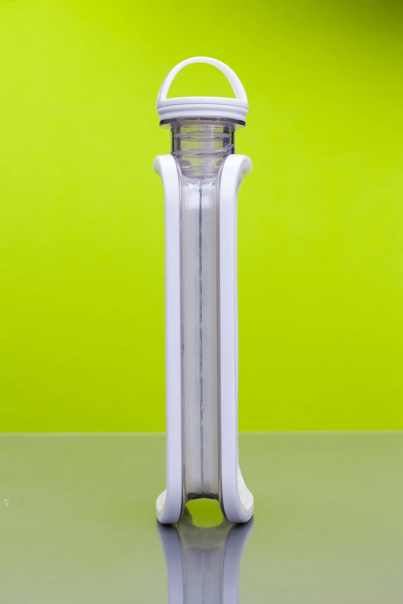 A clear ice press on a bright yellow seamless ground.